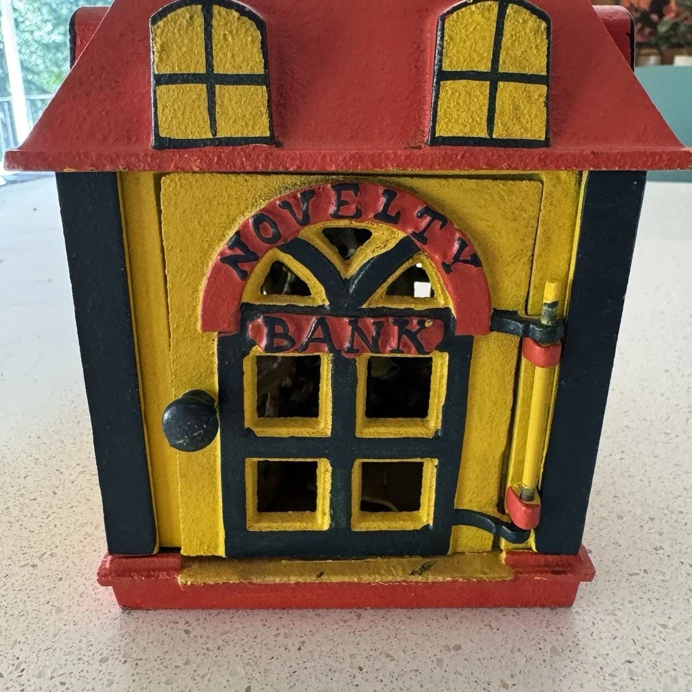 Vintage Cast Iron Novelty Mechanical Coin Bank Building with Teller Rproduction
